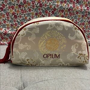 YSLOpium Cream and Gold Cosmetic Bag